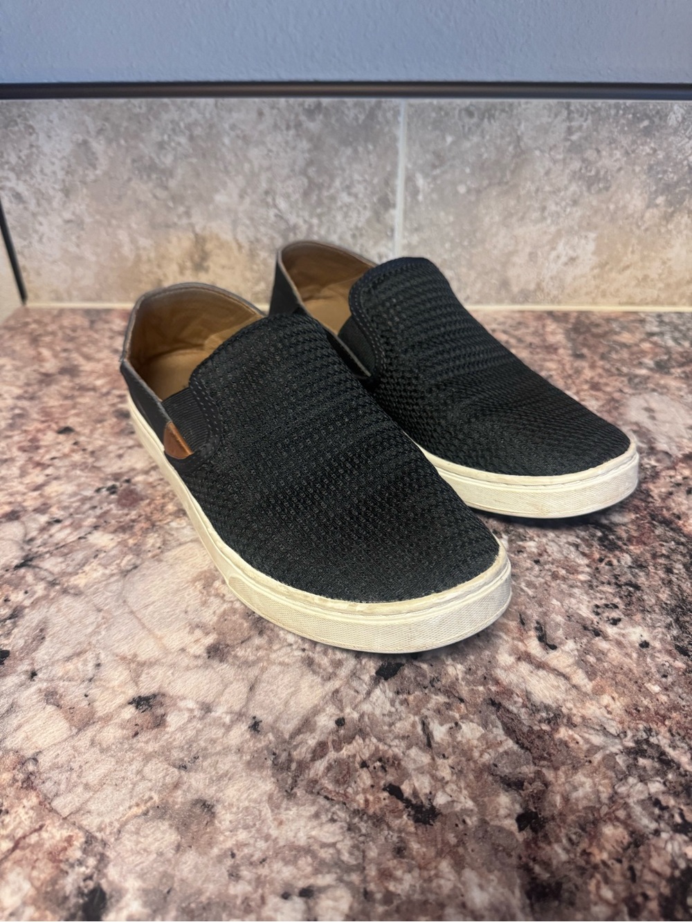 OluKai Pehuea Black Knit Slip-On Sneakers | Women’s US 8.5